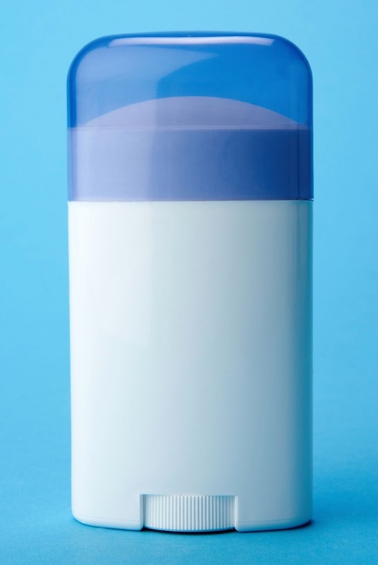 White travel-sized stick with a translucent blue cap, standing against a solid blue background. A practical and TSA-friendly travel stocking stuffer for freshening up on the go.